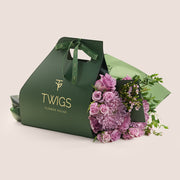 Emirati Women's Day lavender roses and purple chrysanthemums hand-tied bunch in a TWIGS bag, Green and Beige options