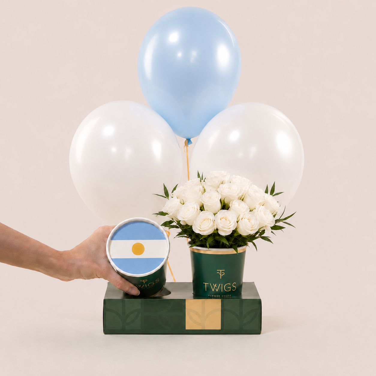FIFA Argentina: White rose bouquet with light blue and white balloons and Argentina flag cake in cup, TWIGS Flower House