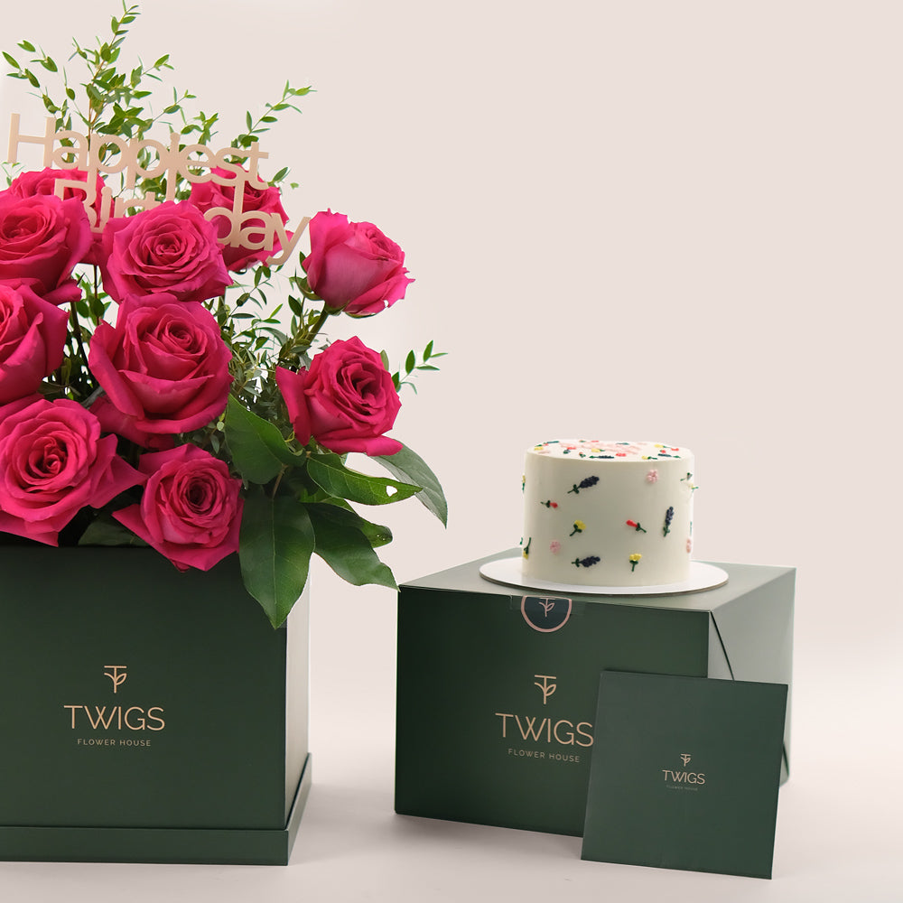 Fresh flowers fuchsia roses and cake gift bundle TWIGS Dubai