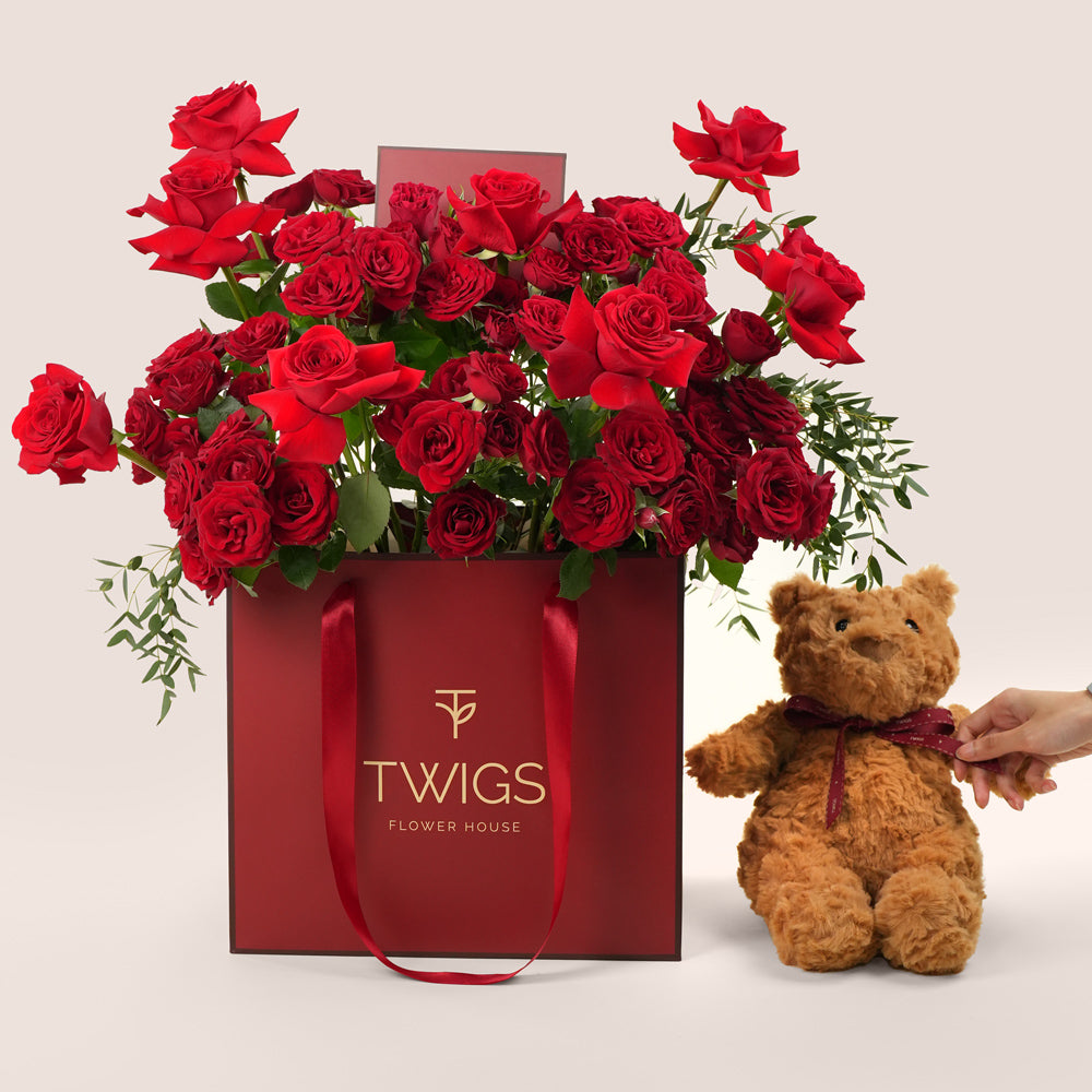luxury red roses bouquet in gift bag with teddy valentine’s day flower delivery uae