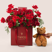 luxury red roses bouquet in gift bag with teddy valentine’s day flower delivery uae