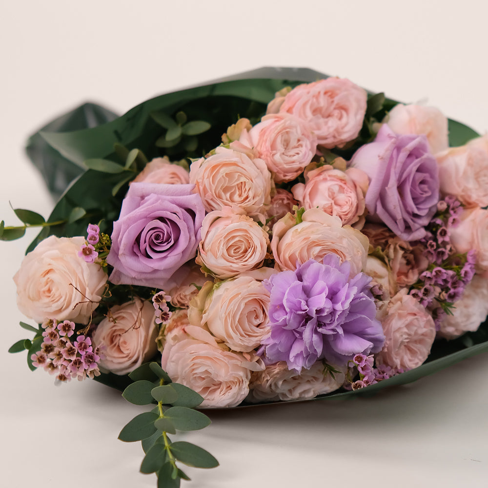 Purple and Pink flower bouquet by TWIGS same day flower delivery
