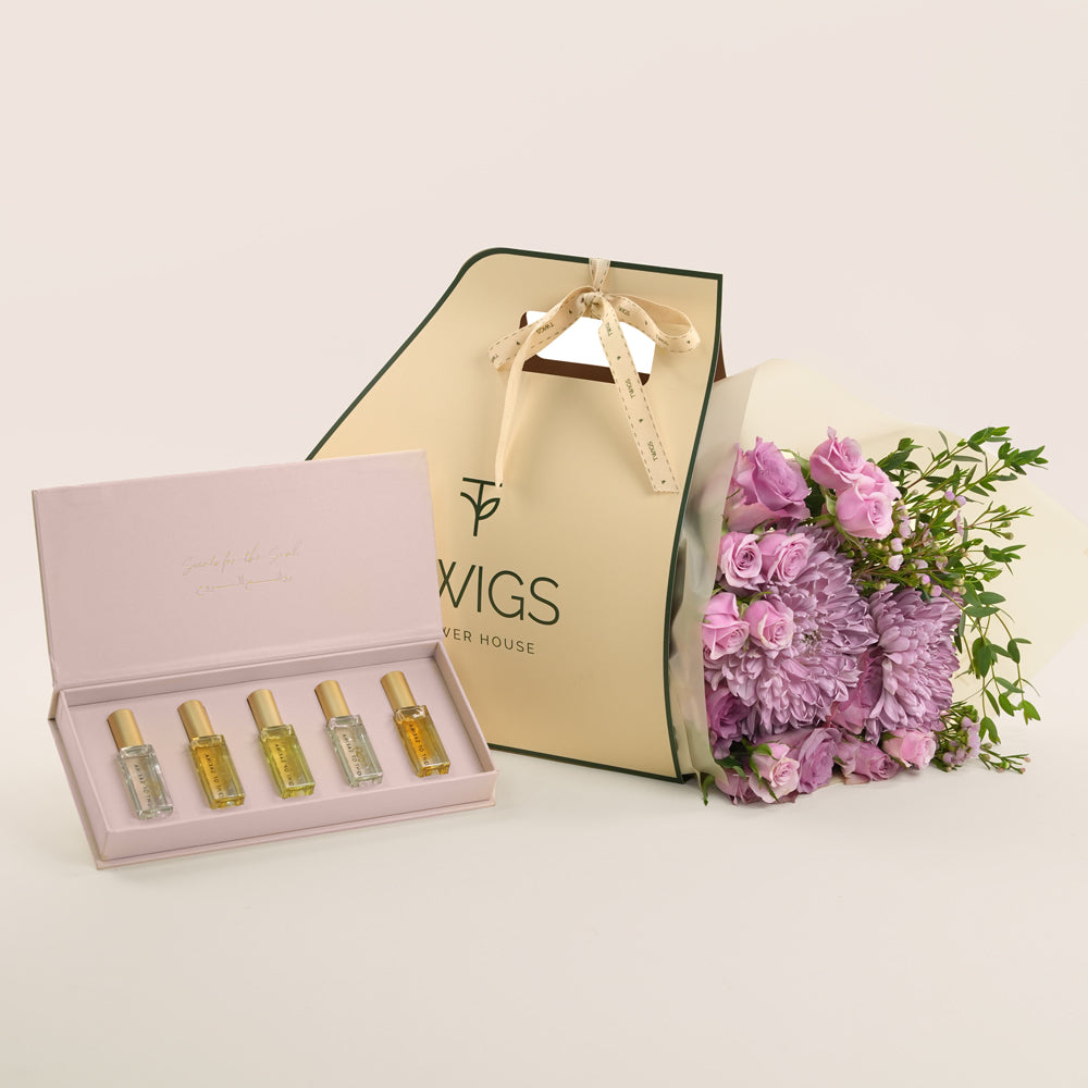 Emirati Women's Day lavender roses and purple chrysanthemums bunch bag bundled with Light of Sakina Massarah perfume oil discovery set
