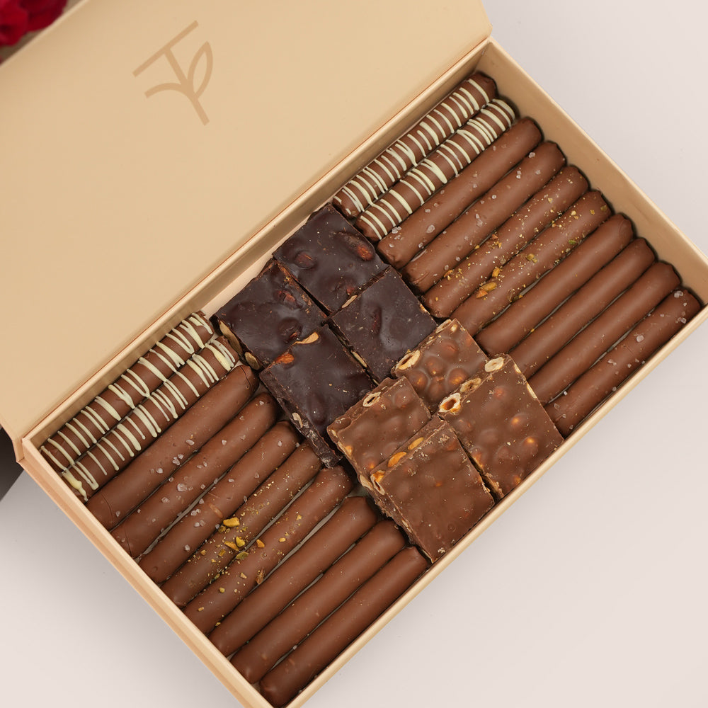 Red Roses Bouquet in Burgundy Bag with Balloons & Chocolates – Valentine’s Day Flower Delivery in UAE