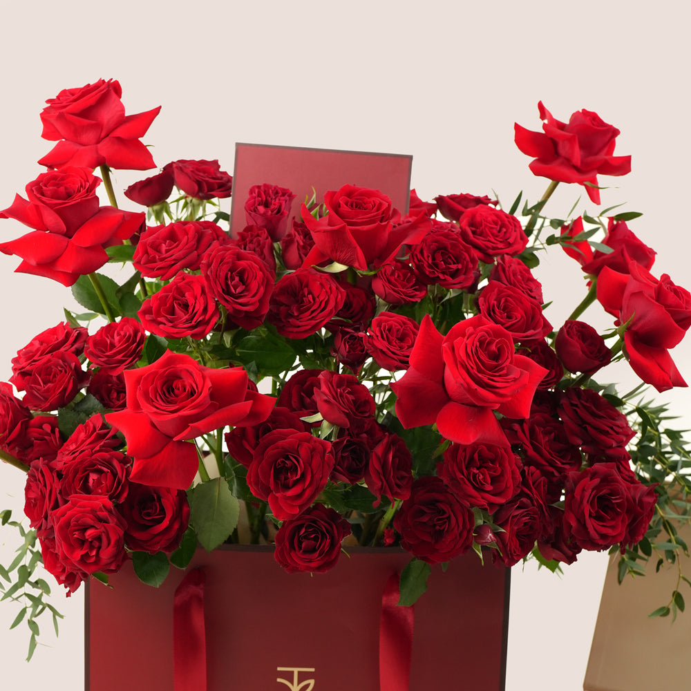 romantic red rose bouquet with chocolate box and balloons same day delivery dubai