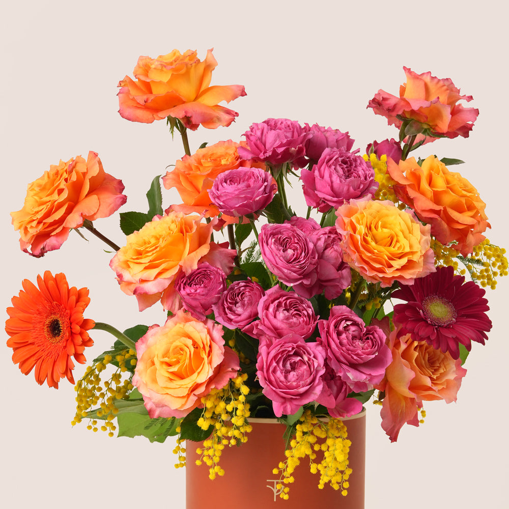 Luxury Ramadan flower arrangement with orange Ecuador roses, fuchsia spray roses and gerberas in TWIGS box – UAE delivery
