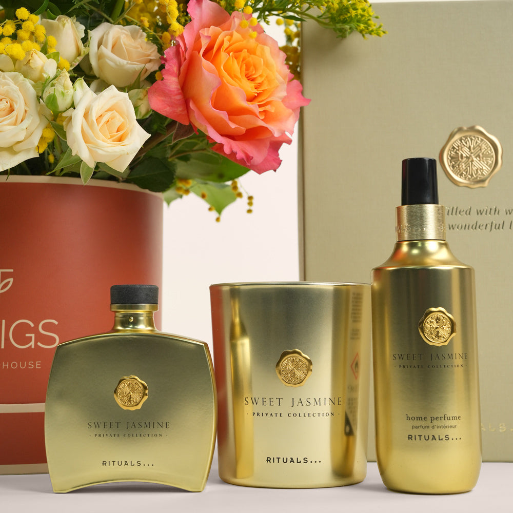 Luxury Ramadan flower arrangement with orange Ecuador roses and spray roses paired with Rituals Sweet Jasmine candle and fragrance gift set – UAE delivery