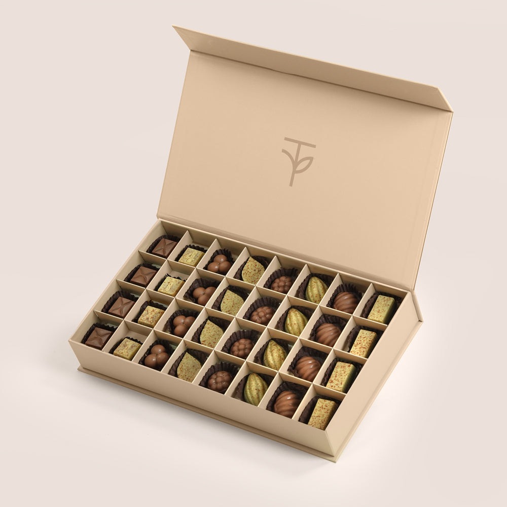 TWIGS signature cream box open showing 32 assorted handcrafted chocolates, Father's Day gift Dubai