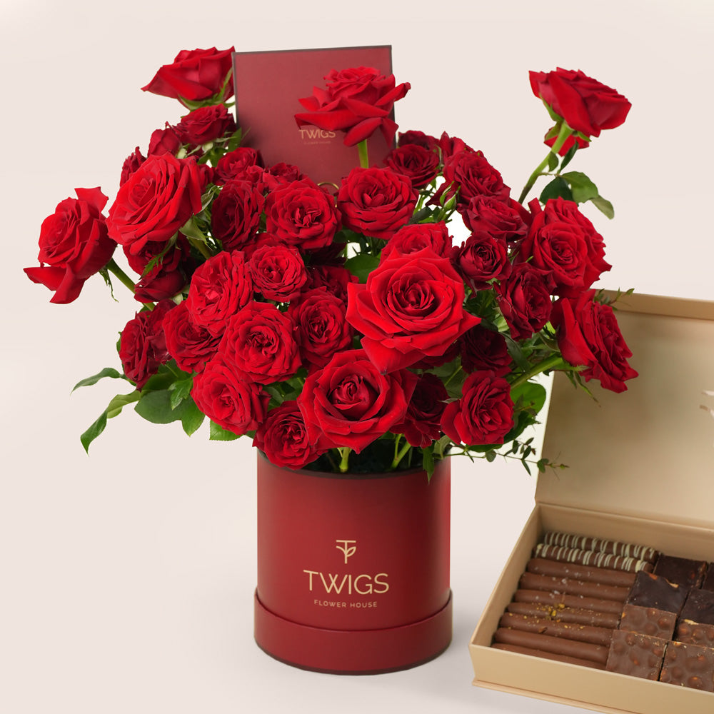 premium red roses luxury hat box arrangement twigs flower house