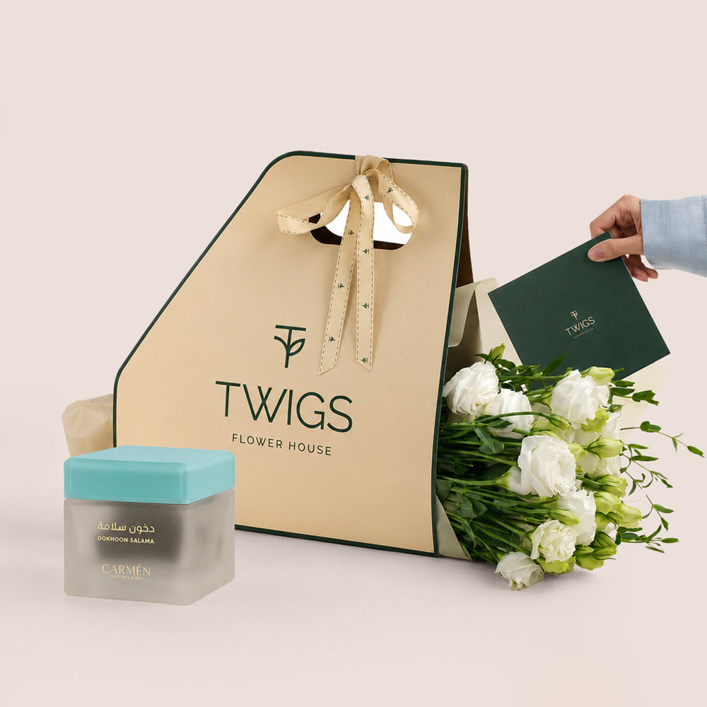 White lisianthus bouquet with Dokhoon Salama bakhoor jar by Carmen Perfumes Dubai