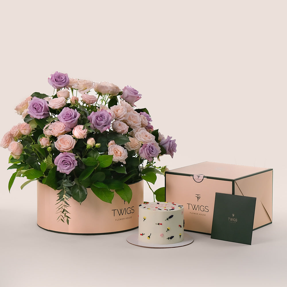 Birthday Perfection Grande Round Box – Lavender Roses & Floral Cake Bundle – A Luxurious Celebration of Flowers and Flavor