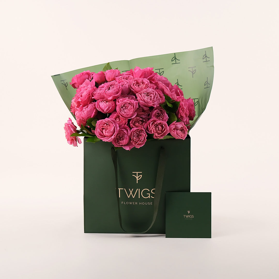 Blooming Fuchsia Flowers Hand Bouquet – Bold Color in a Chic Gift Bag