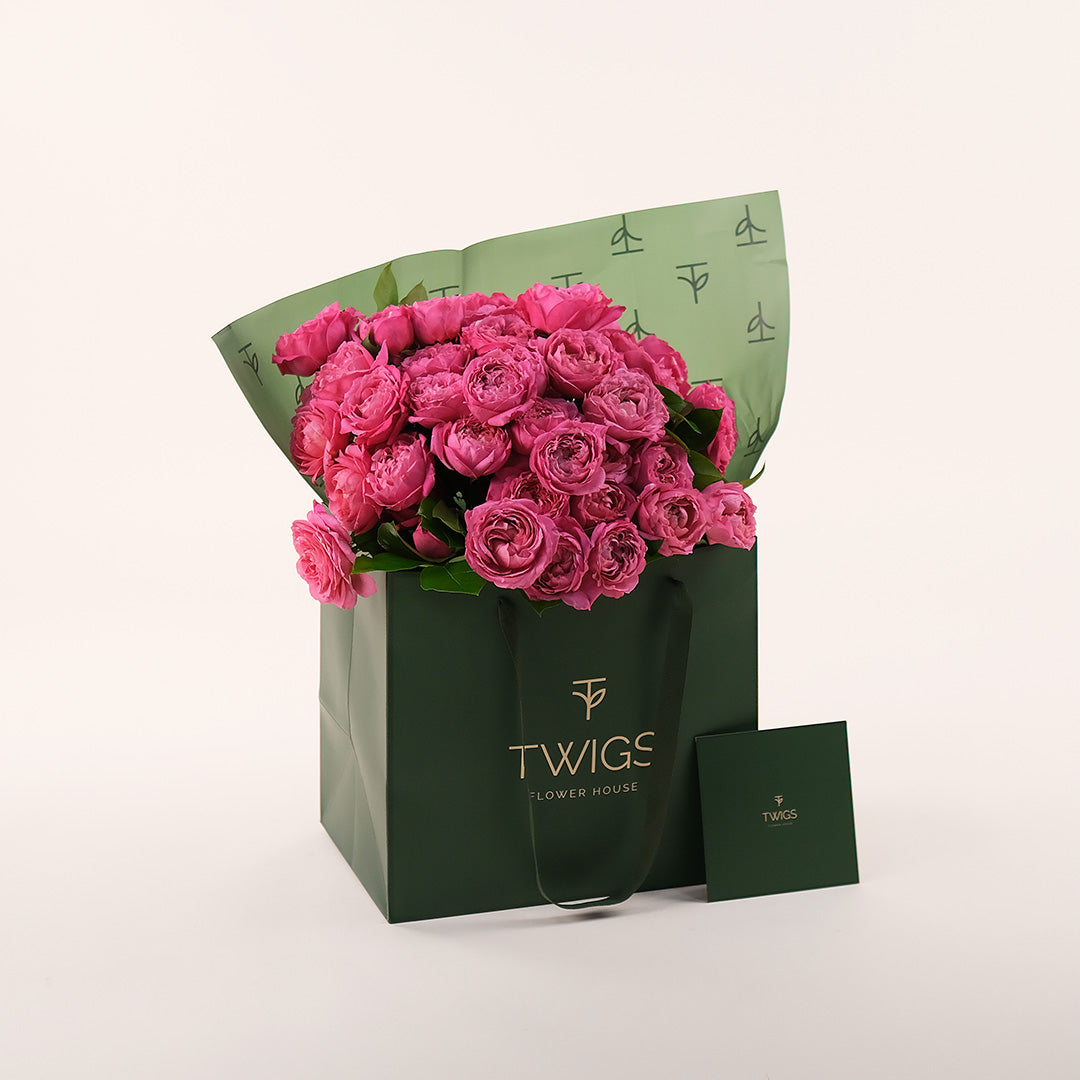 Blooming Fuchsia Flowers Hand Bouquet – Bold Color in a Chic Gift Bag