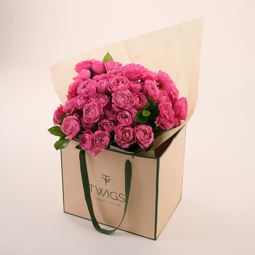 Blooming Fuchsia Flowers Hand Bouquet – Bold Color in a Chic Gift Bag