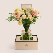 Pastel rose and lisianthus tall vase arrangement in TWIGS beige gift box — Eid Al Adha flower delivery Dubai