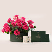 Close-up of fuchsia Pink Floyd roses arrangement in TWIGS flower box - bold birthday gift UAE