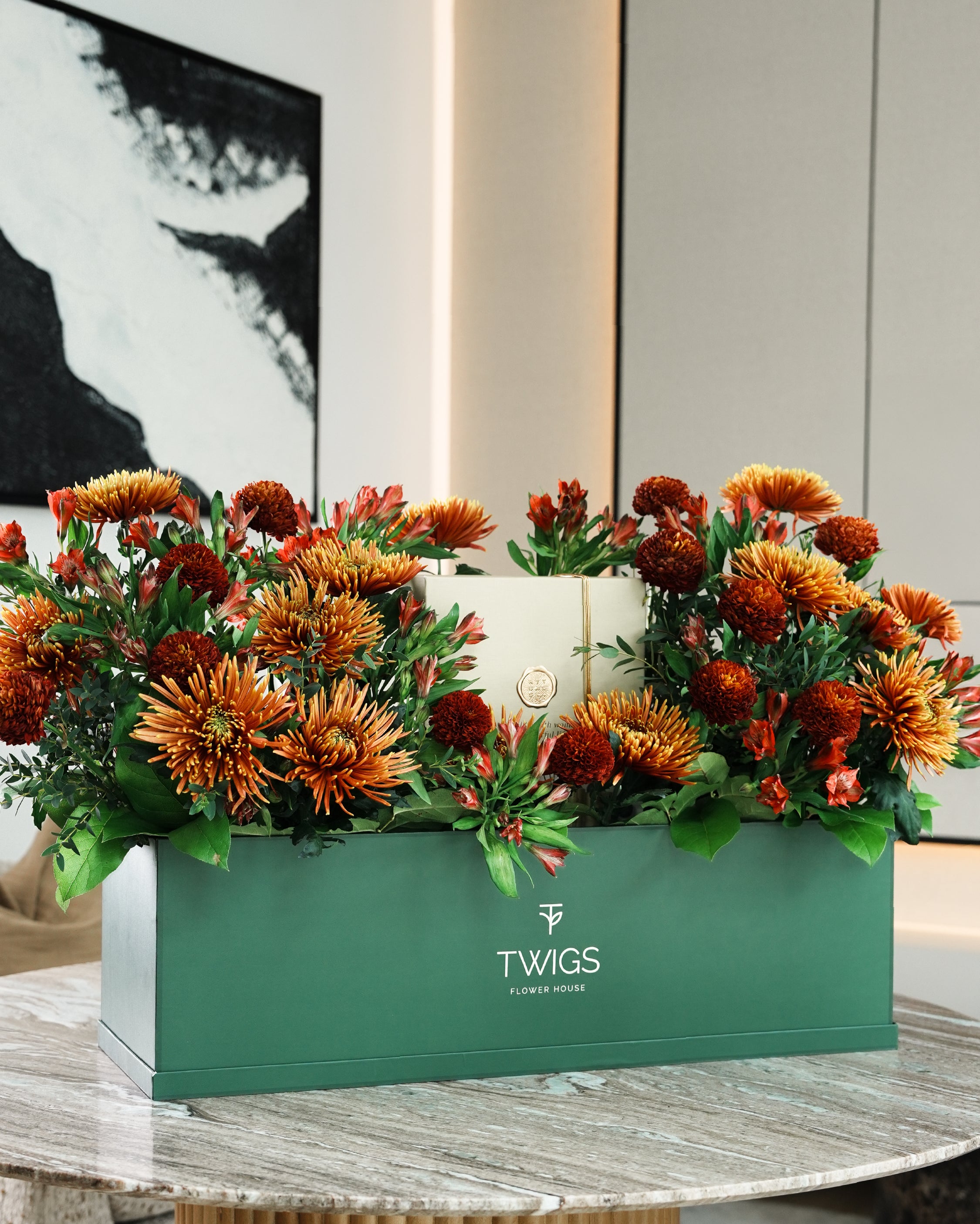 Eid garden box flower arrangement with saffina chrysanthemums, burgundy ping pong chrysanthemums and Rituals Sweet Jasmine gift set by TWIGS Flower House