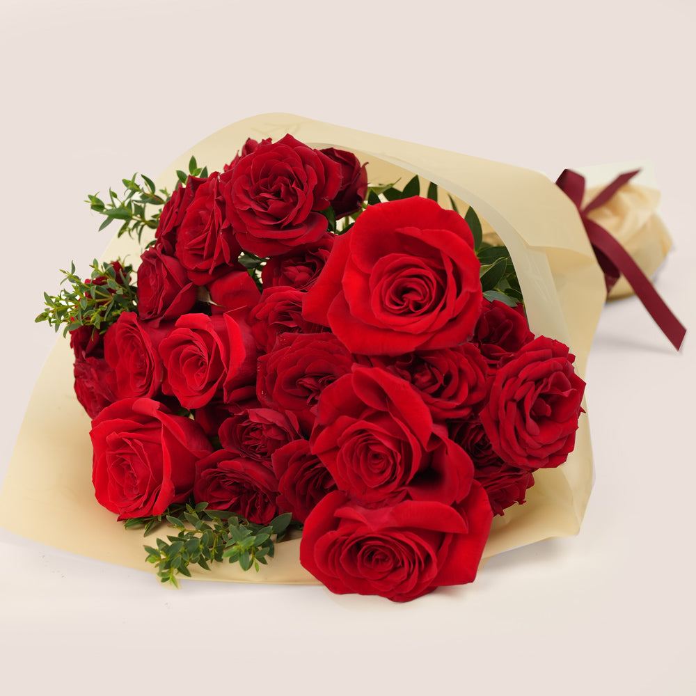 modern valentine bouquet with red roses burgundy packaging uae