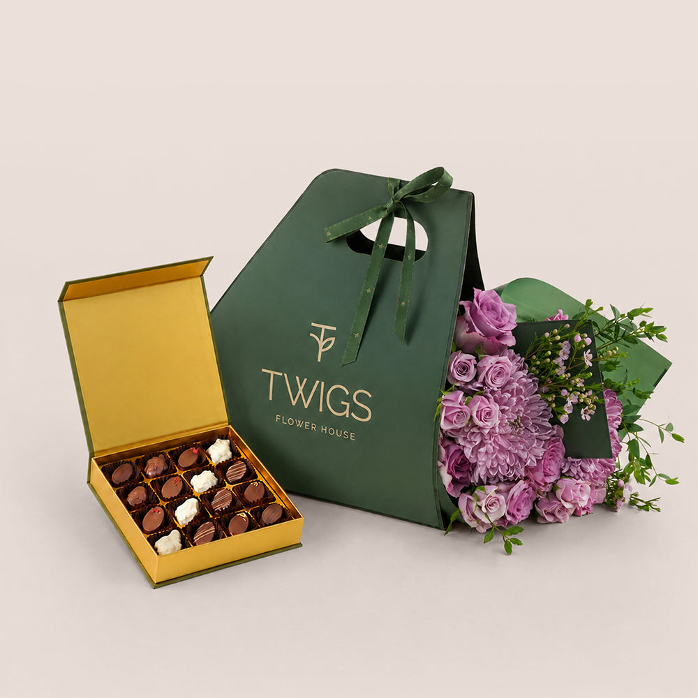 Emirati Women's Day lavender roses and purple chrysanthemums bunch bag bundled with Bateel Palm Gift Set date chocolates