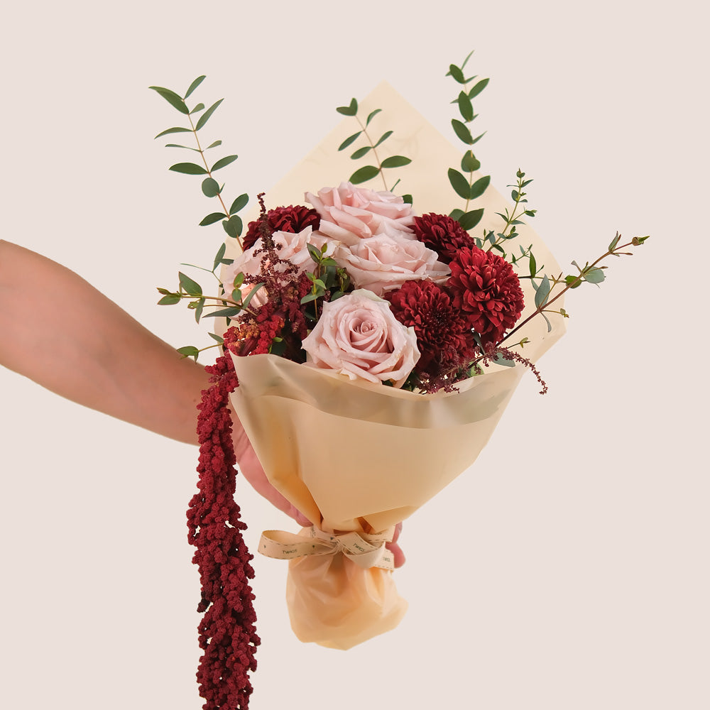 Manar’s Choice – Burgundy & Neutral Flowers Hand Bouquet in TWIGS Cone Bag