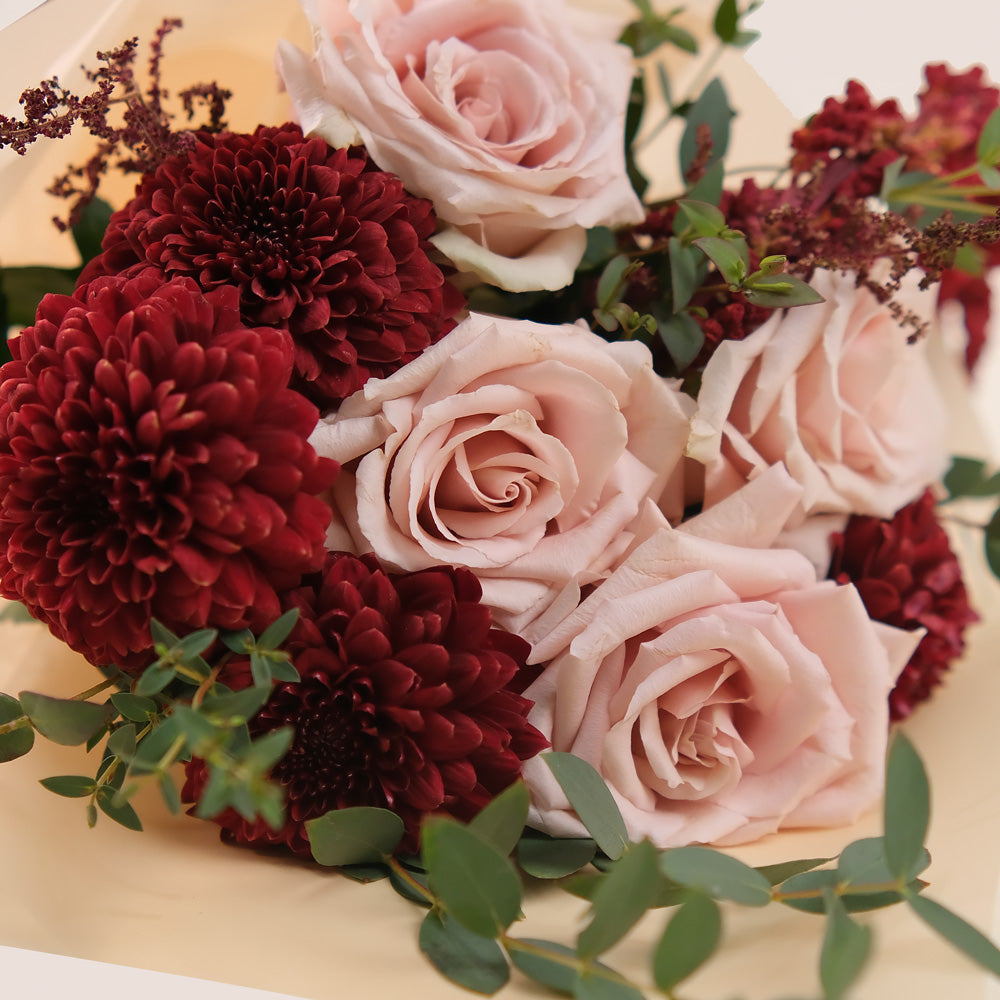 Manar’s Choice – Burgundy & Neutral Flowers Hand Bouquet in TWIGS Cone Bag