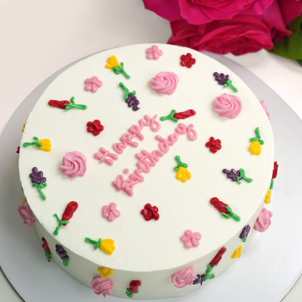 Premium birthday cake with fuchsia roses