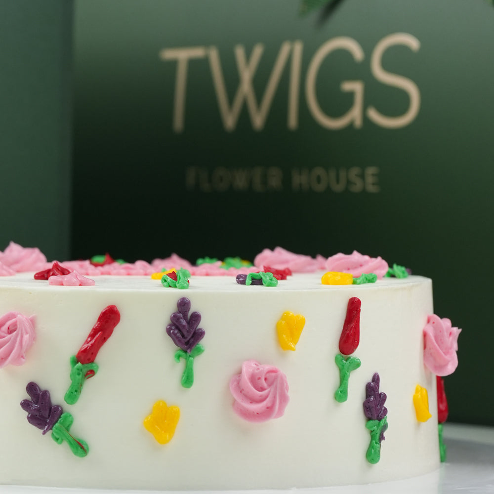 Premium birthday cake with fuchsia roses