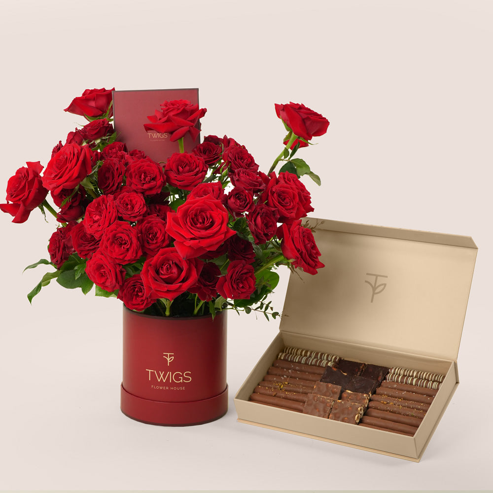 luxury red roses hat box with premium chocolates valentine’s day flower delivery uae