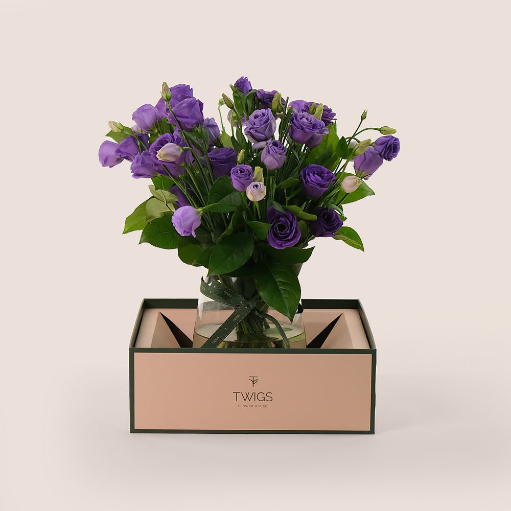 Purple Charm – A Delicate Arrangement of Grace and Elegance