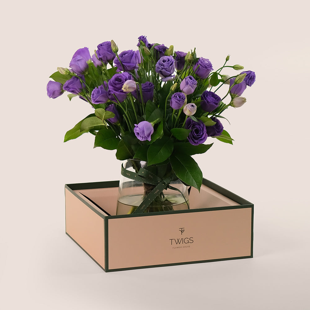 Purple Charm – A Delicate Arrangement of Grace and Elegance