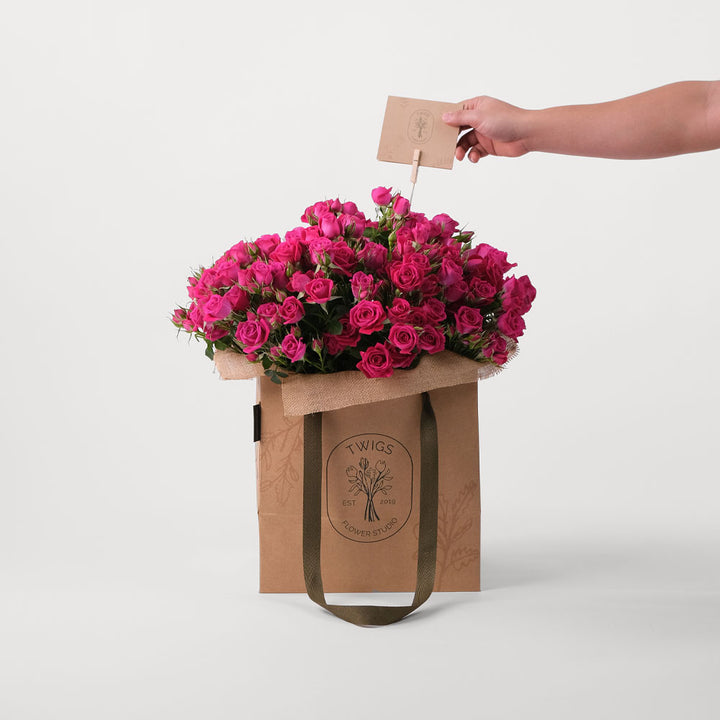 Spray Rose Fuchsia Flowers Bouquet In A Bag