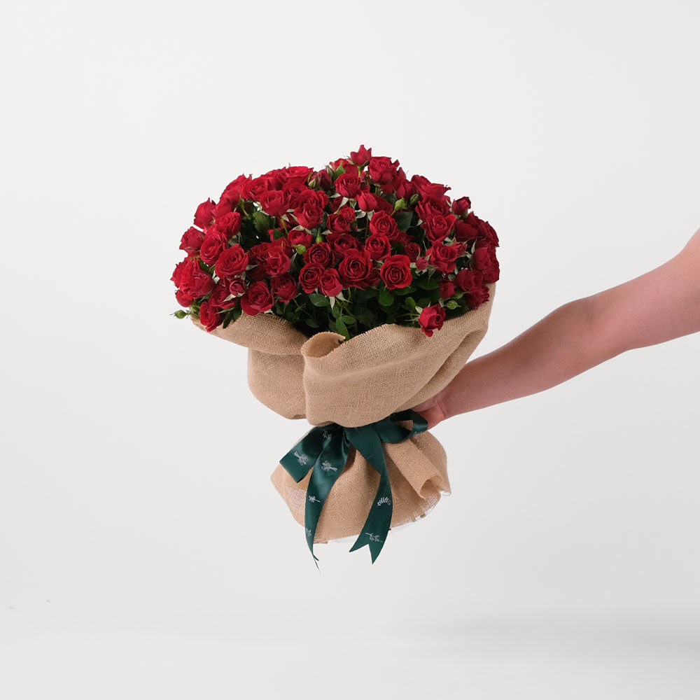 Red Spray Rose Flowers Bouquet In A Bag