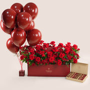 luxury red roses garden box with balloons and chocolates valentine’s day flower delivery uae