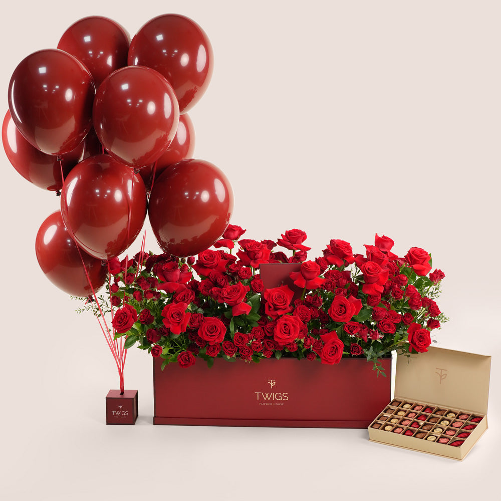 luxury red roses garden box with balloons and chocolates valentine’s day flower delivery uae