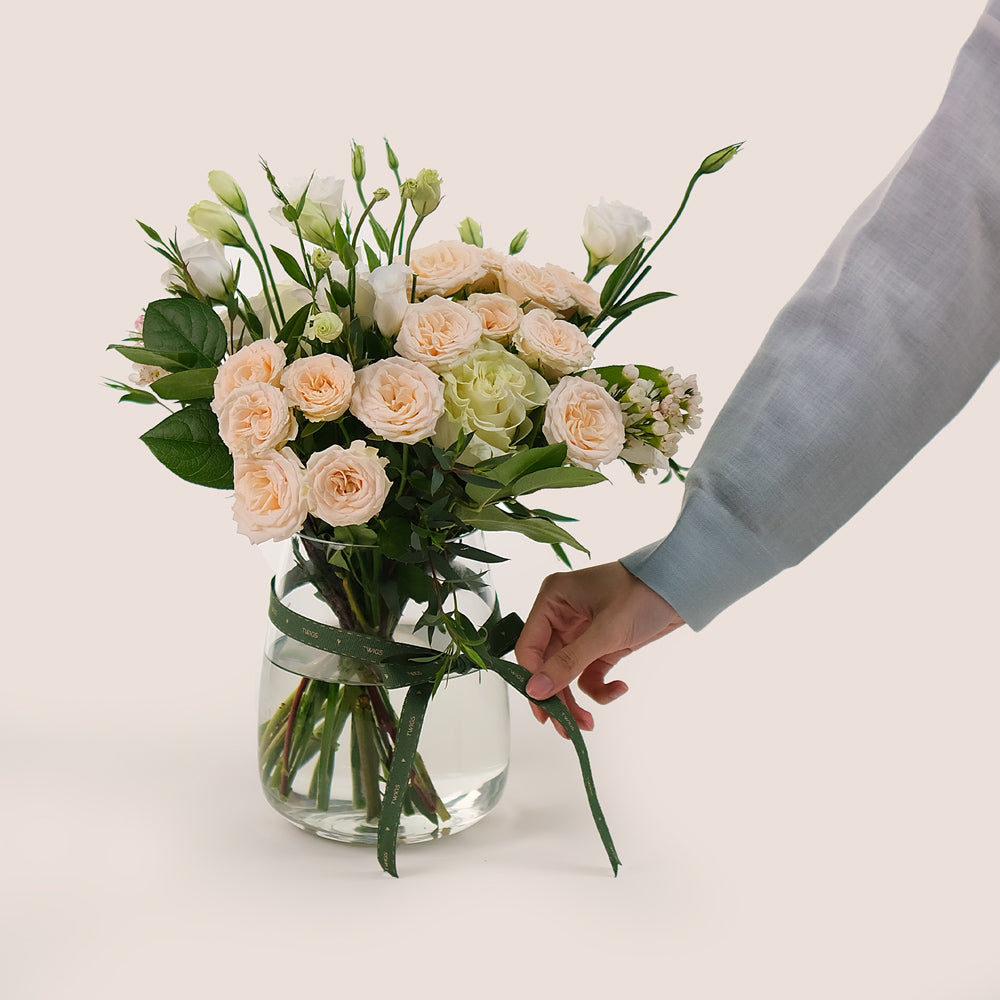 Delicate Beauty in a Petite Vase – A Soft Touch of Floral Elegance