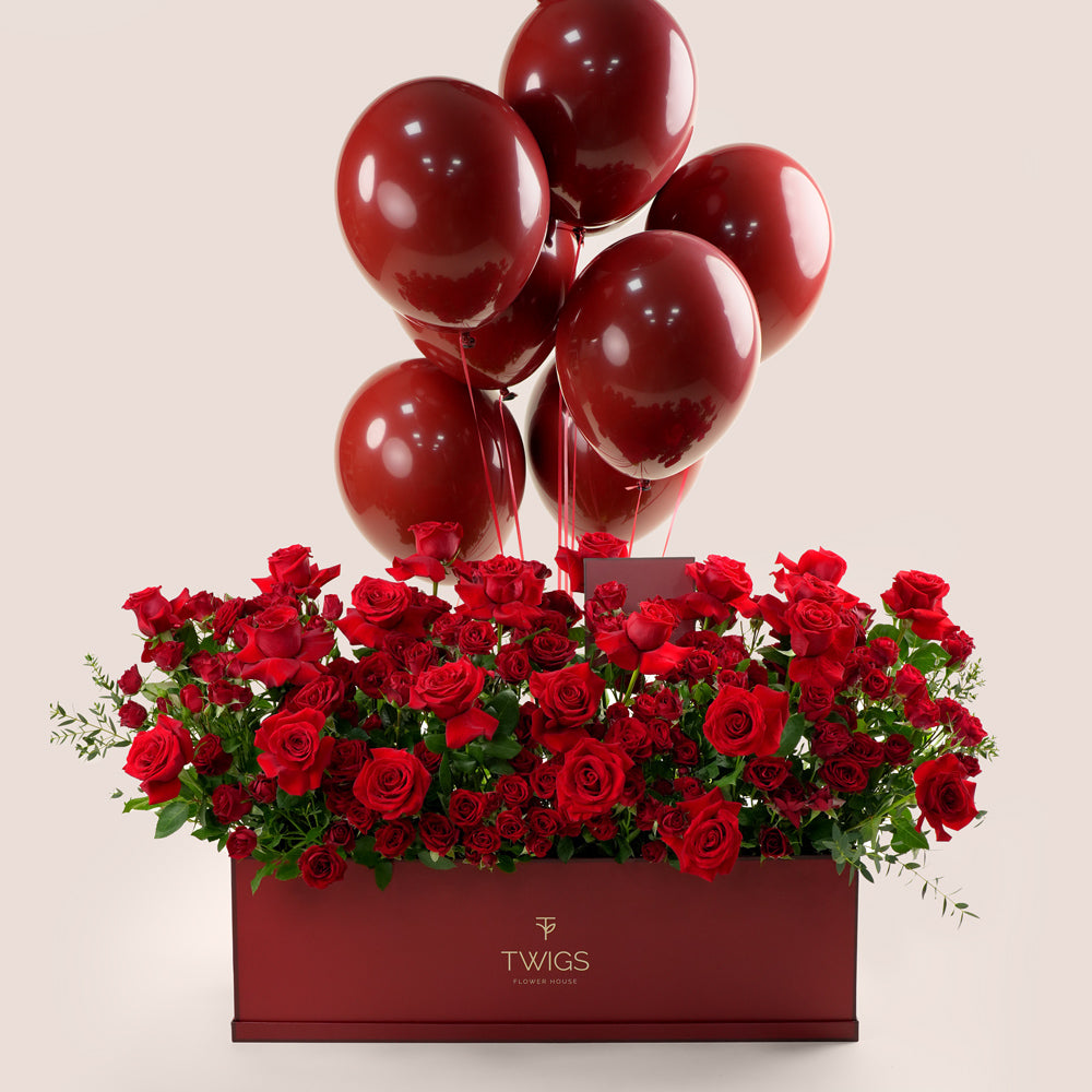 luxury red roses garden box with balloons valentine’s day flower delivery uae