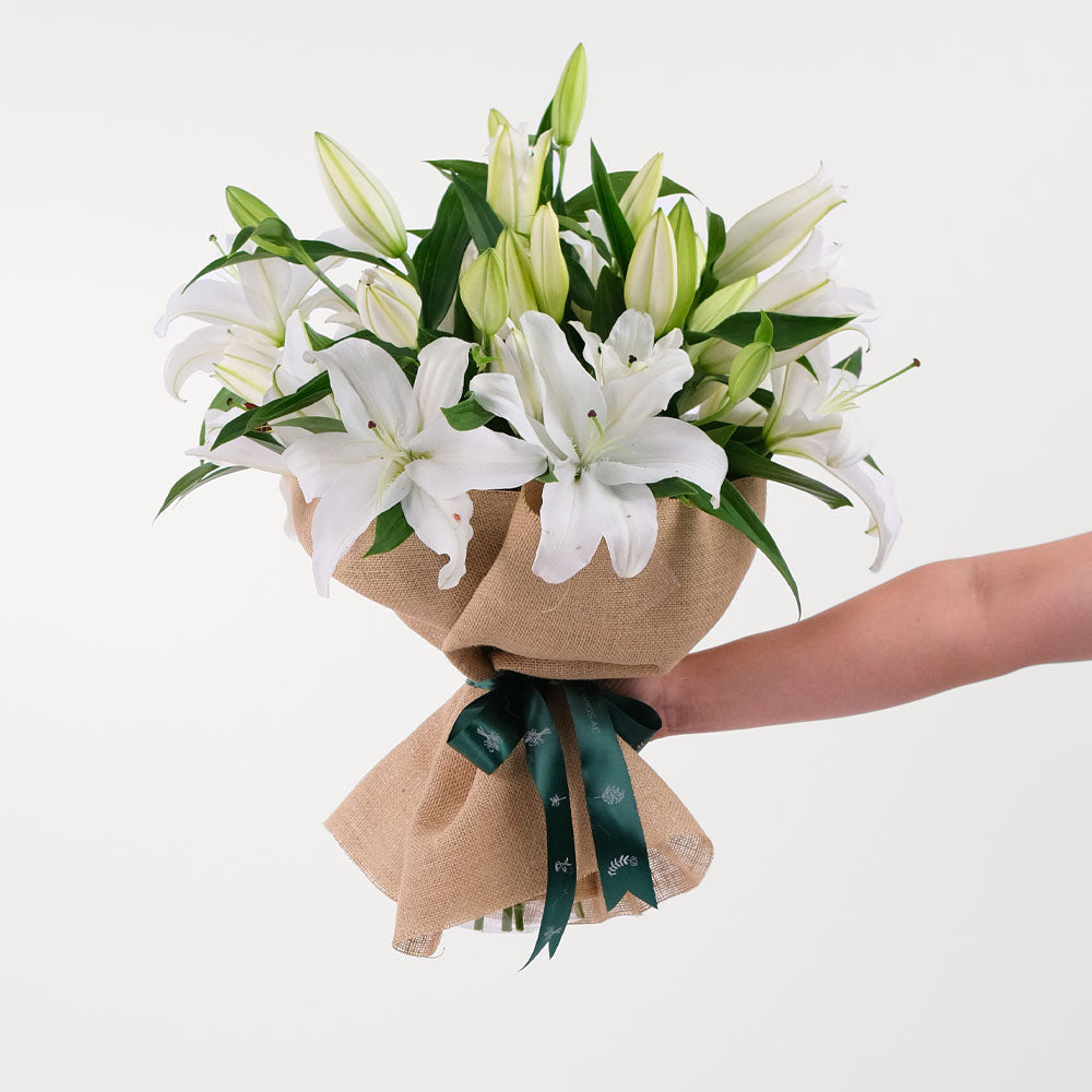 Lilies White Flowers Bouquet In A Bag